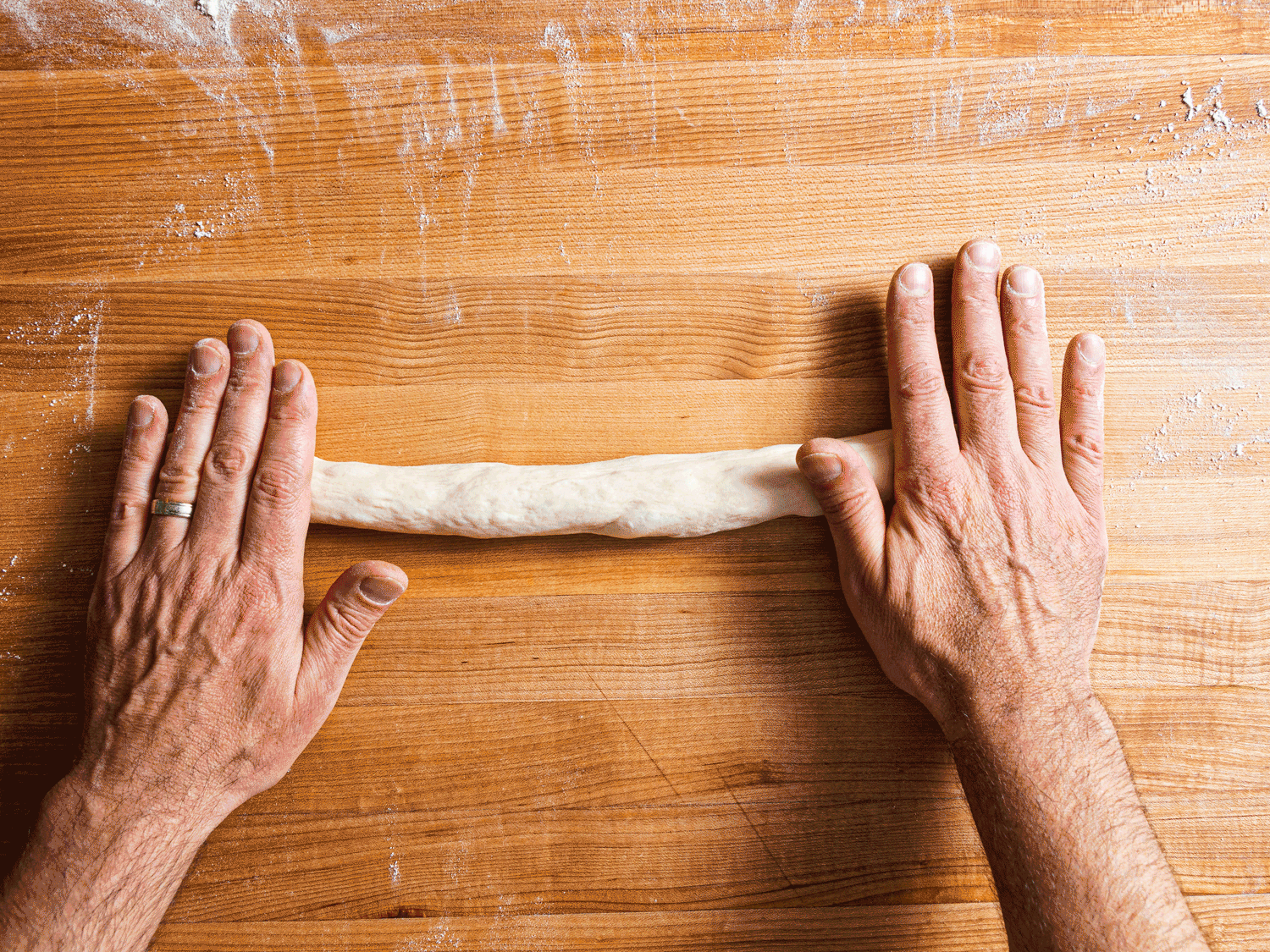 Gif of rolling dough into pointed ends
