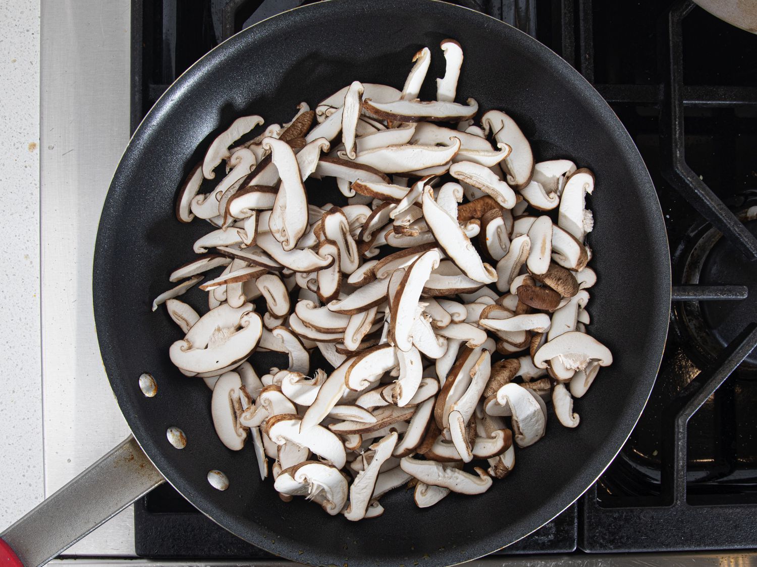Overhead view of mushrooms in a pan
