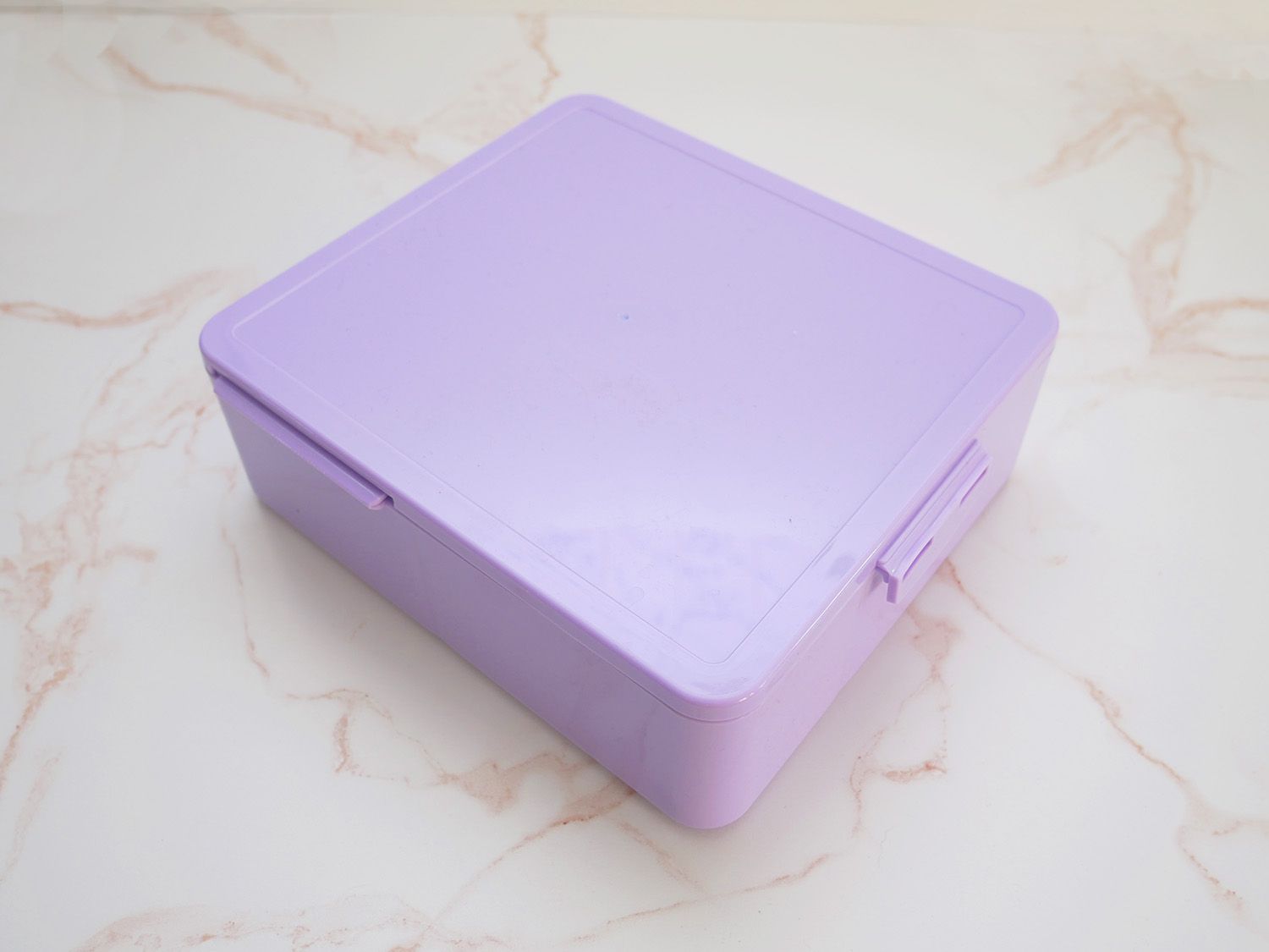 Pottery barn bento box on marble countertop