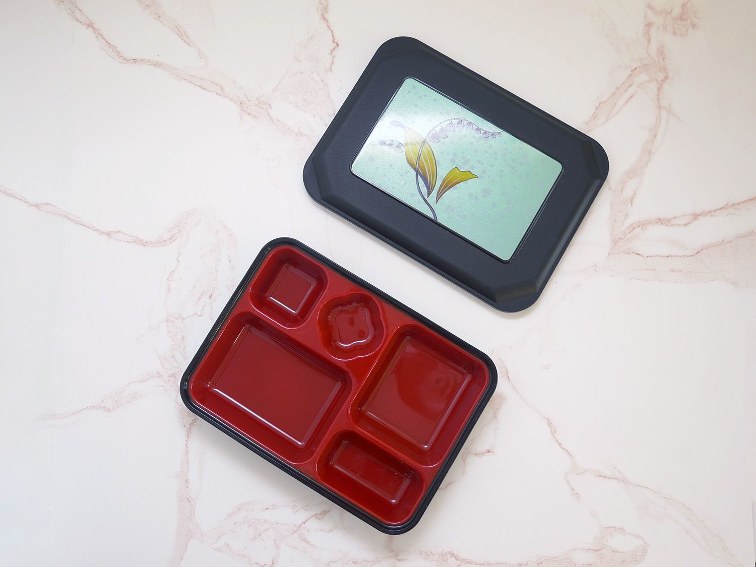traditional style bento box on marble countertop