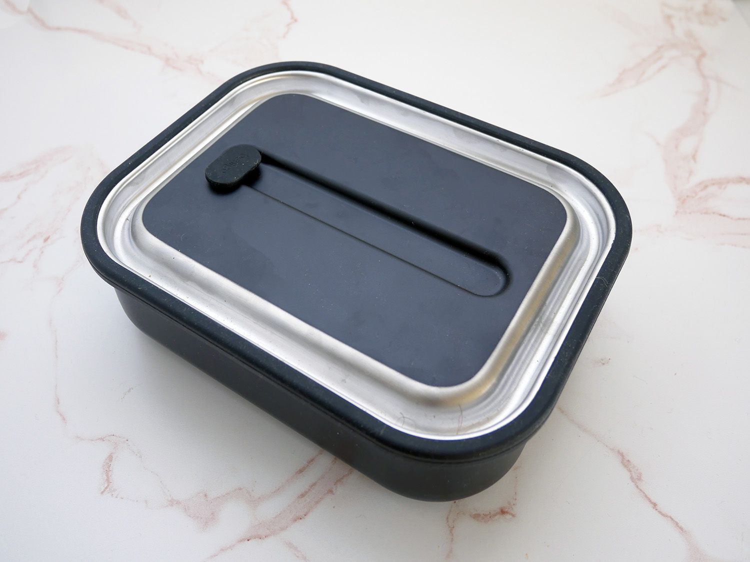 bentgo stainless bento box on a marble countertop