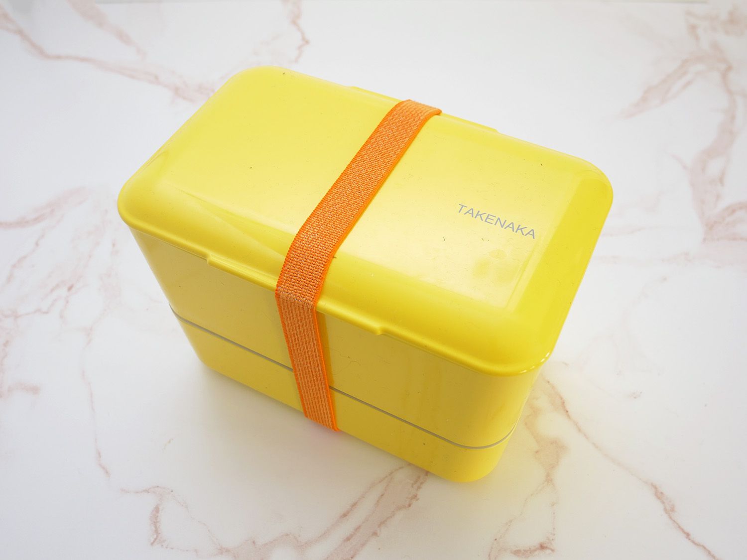 takenaka bento box on a marble countertop