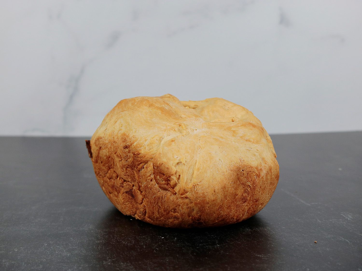 a lumpy improperly risen loaf from the Zojirushi Home Bakery Mini