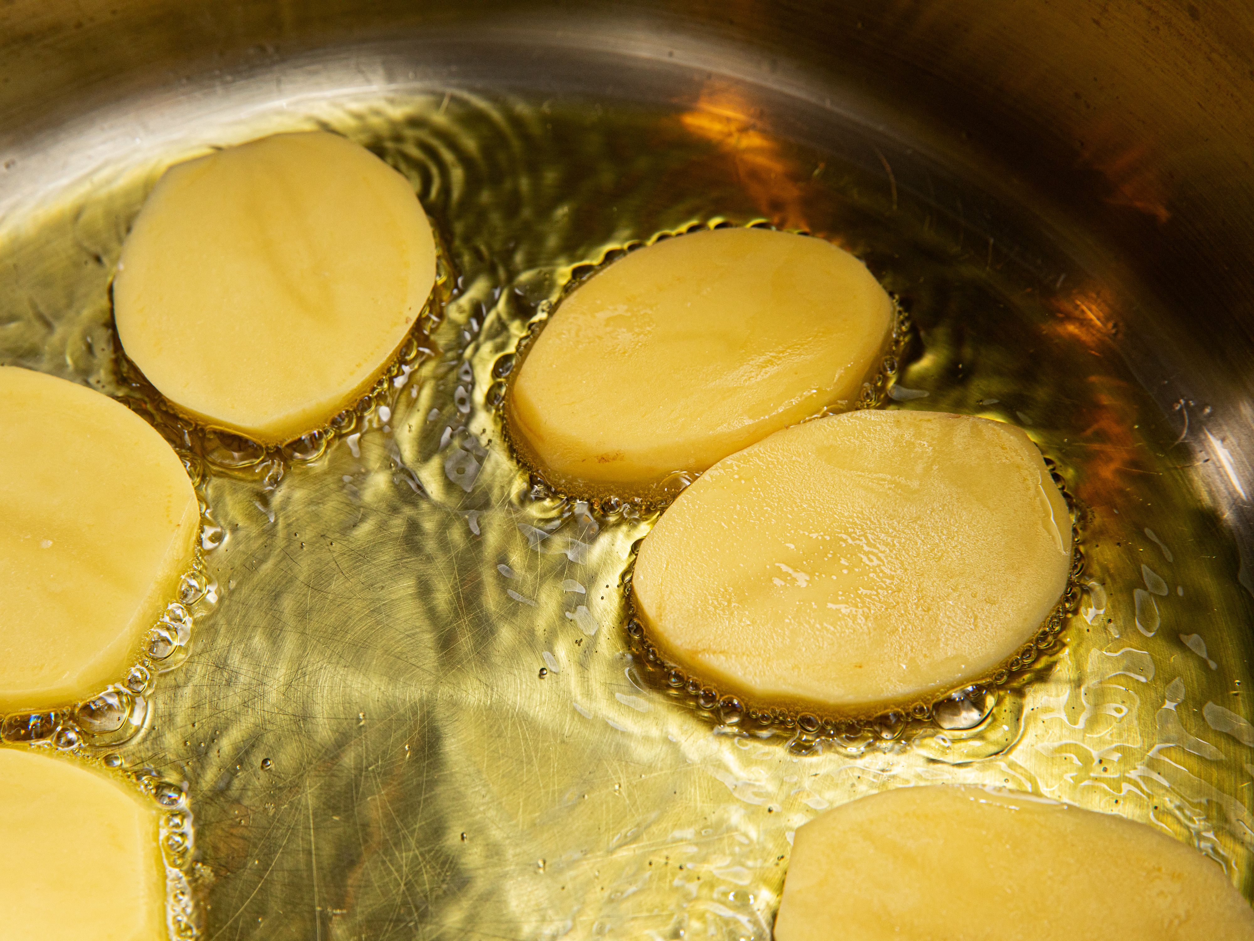 Potatoes frying in oil