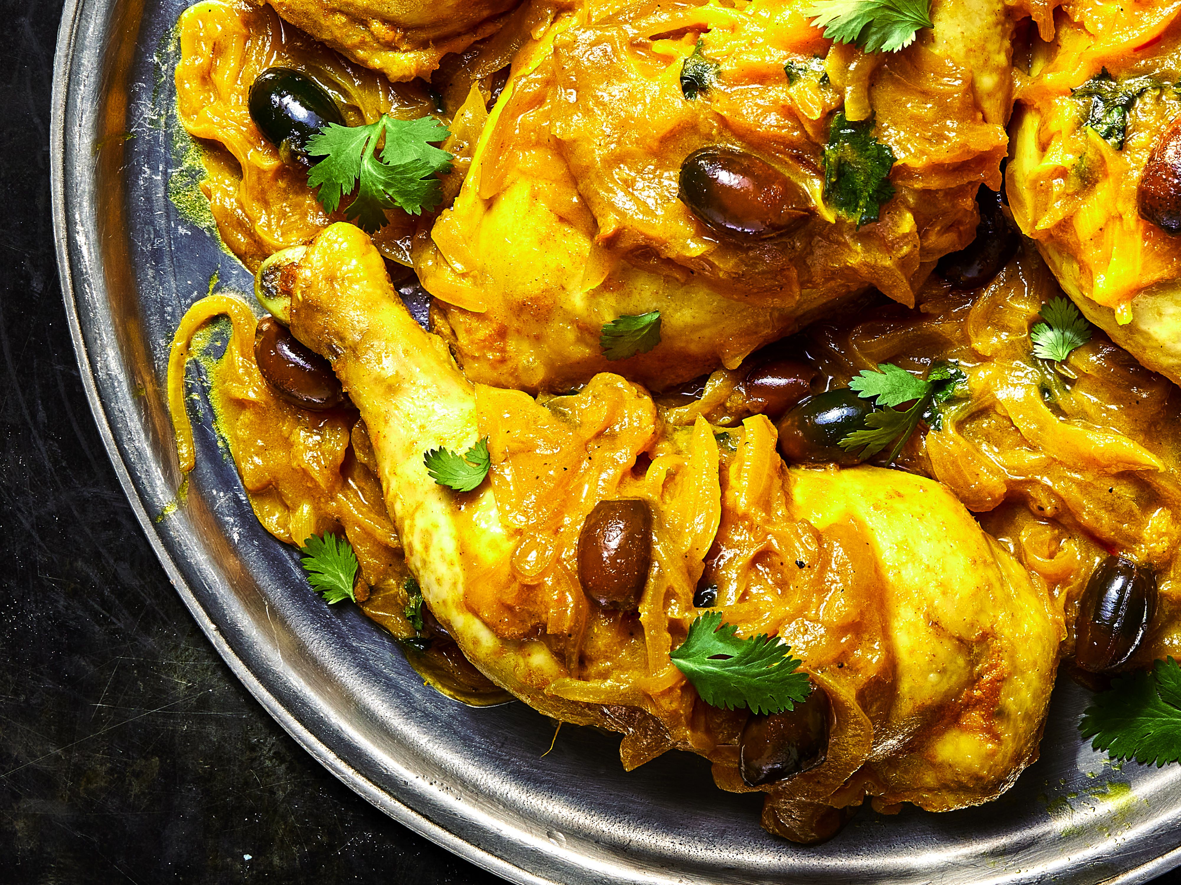 Close up view of Chicken MÃ¢ÂÂqualli Tagine