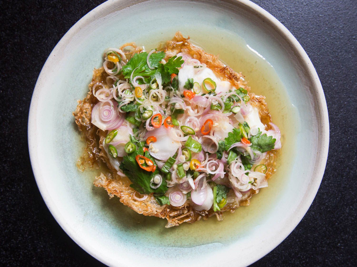 Overhead of yam khai dao on a serving plate.