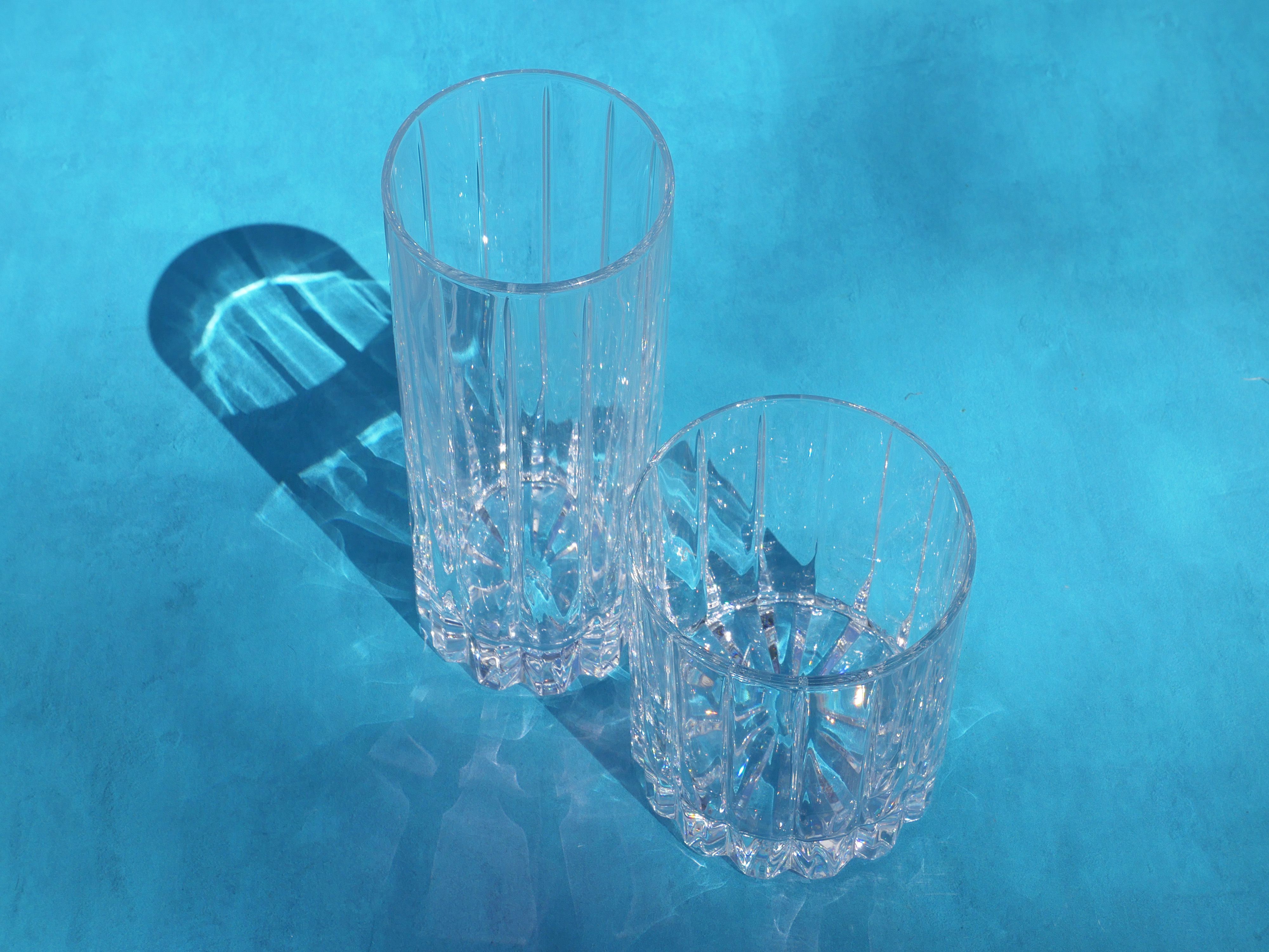 riedel glasses on a blue backdrop