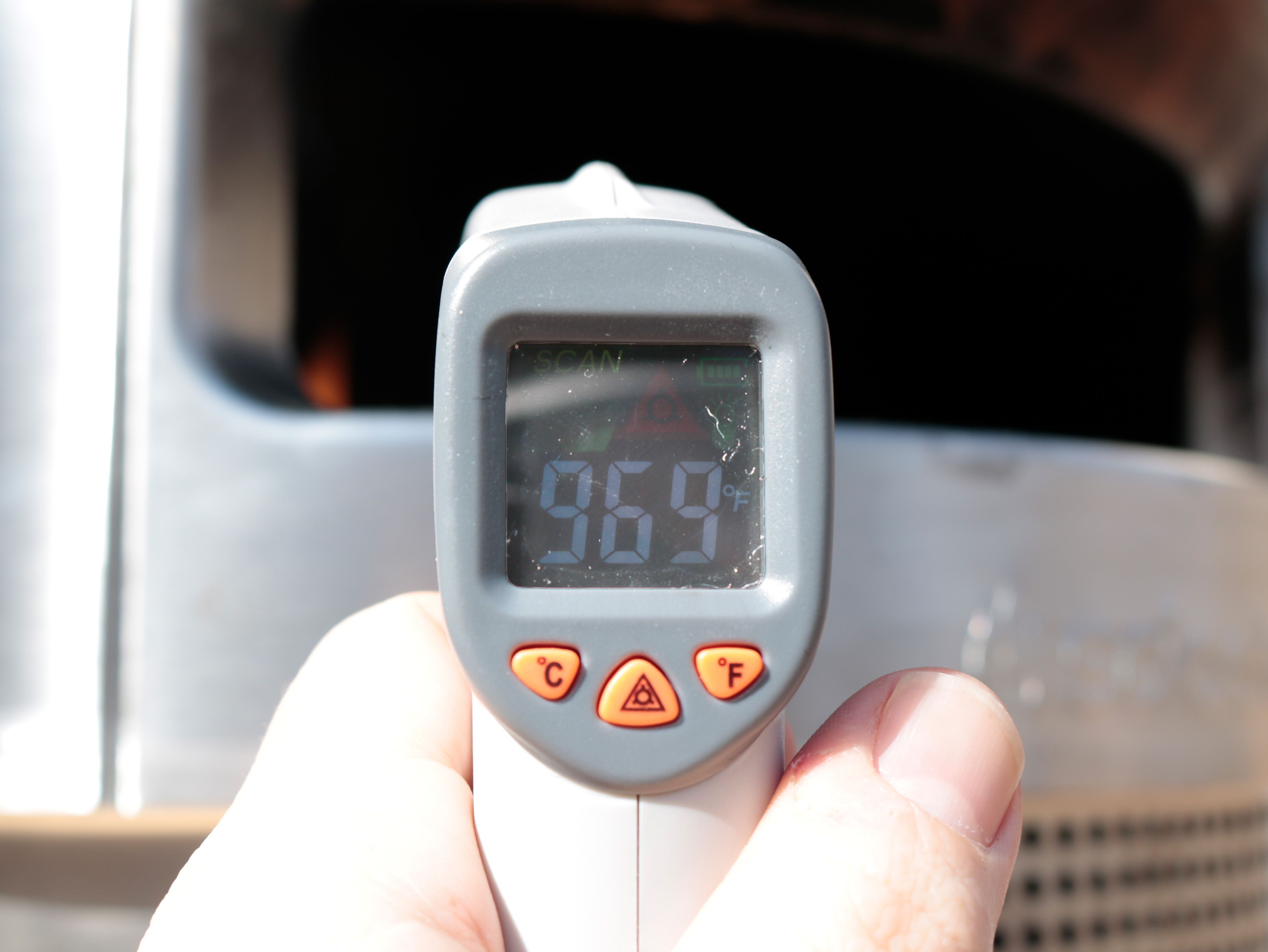 an infrared thermometer reads 969úF