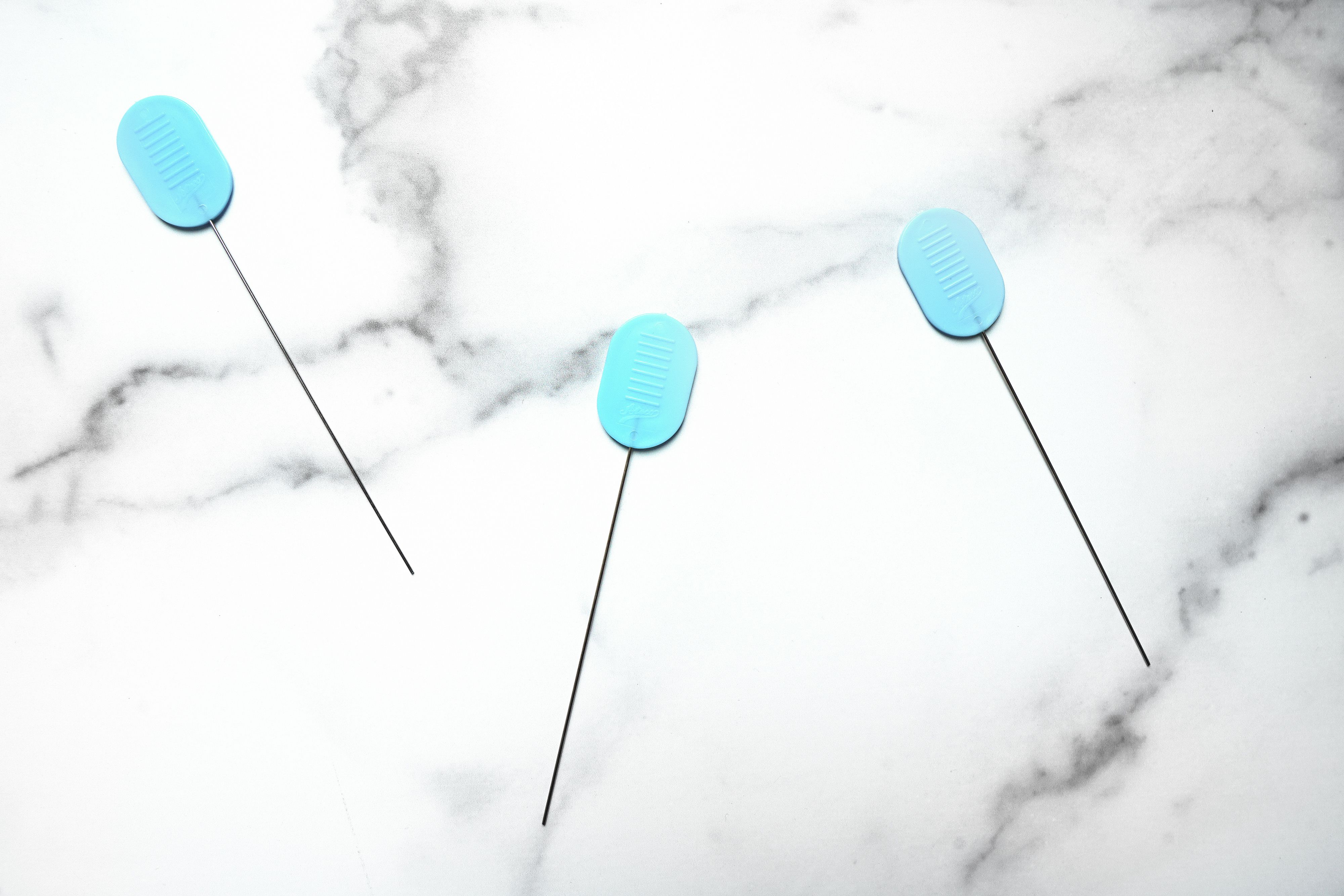 Overhead view of three cake testers