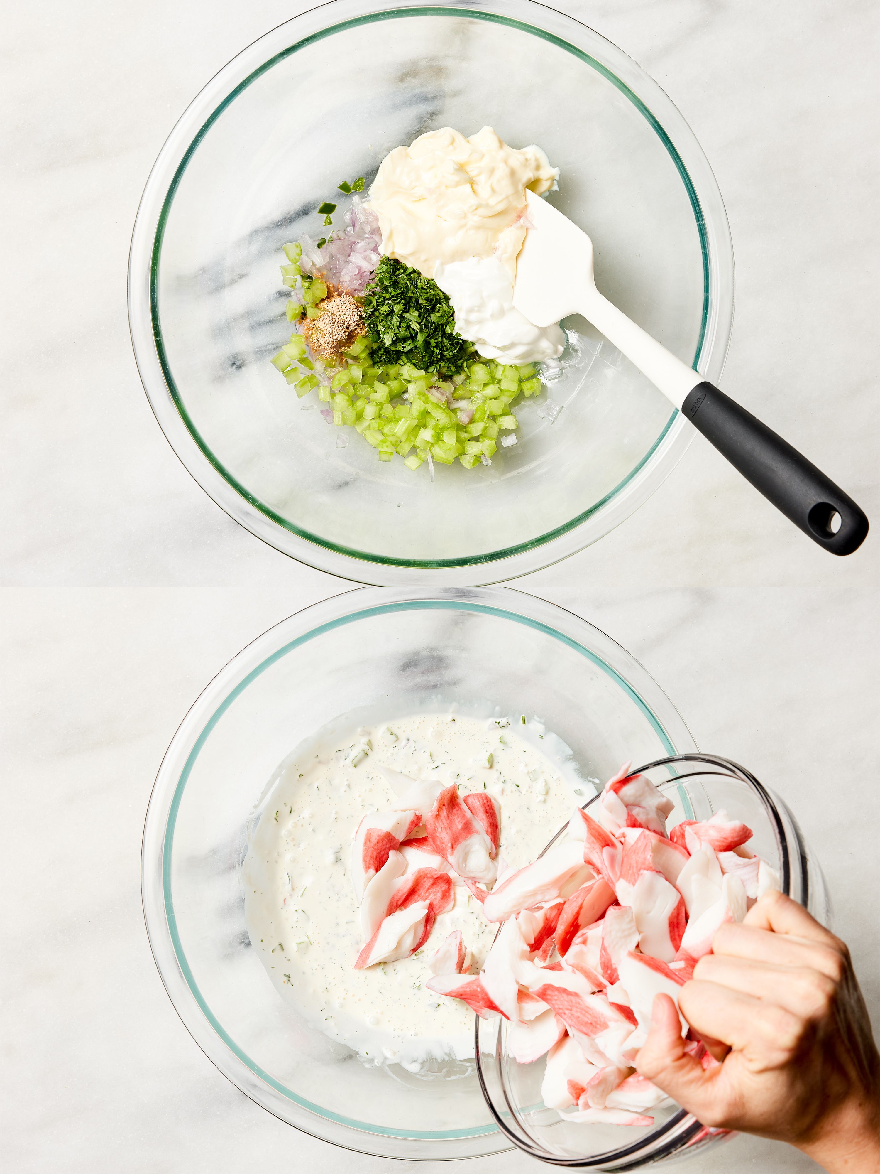 Two image collage of mayo mixture and crab being added to it