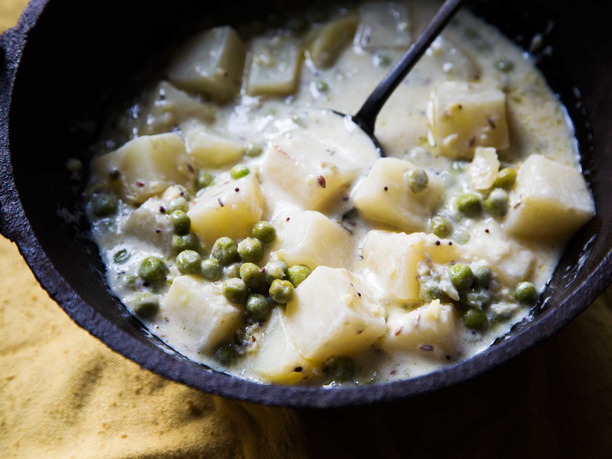 This potato curry recipe uses yogurt for a sauce, thickened with chickpea flour. Get the recipe for <a href="https://www.saveur.com/potatoes-and-peas-in-yogurt-sauce-recipe/">Potatoes and Peas in Yogurt Sauce</a>