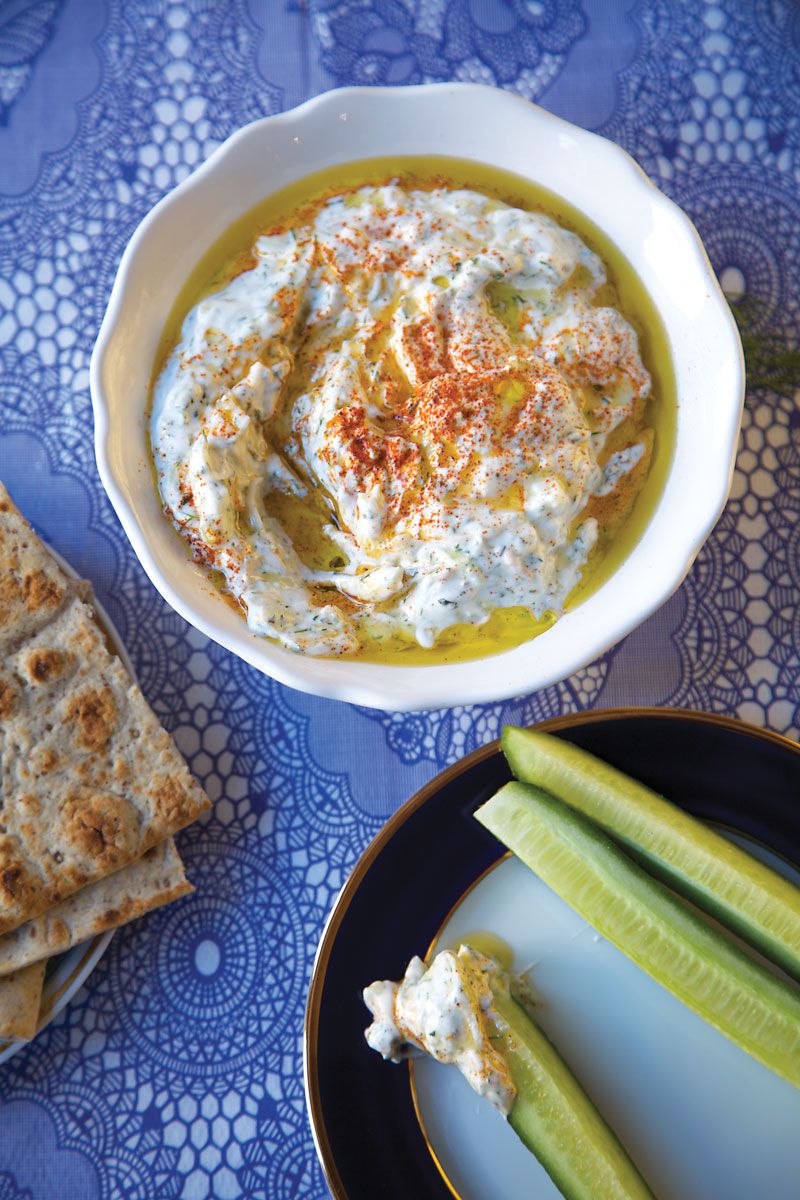 Grated cucumber marries with chopped herbs and aromatics in this iconic Greek yogurt condiment. Get the recipe for <a href="https://www.saveur.com/article/recipes/tzatziki-cucumber-yogurt-dip/">Tzatziki (Cucumber Yogurt Dip)</a>