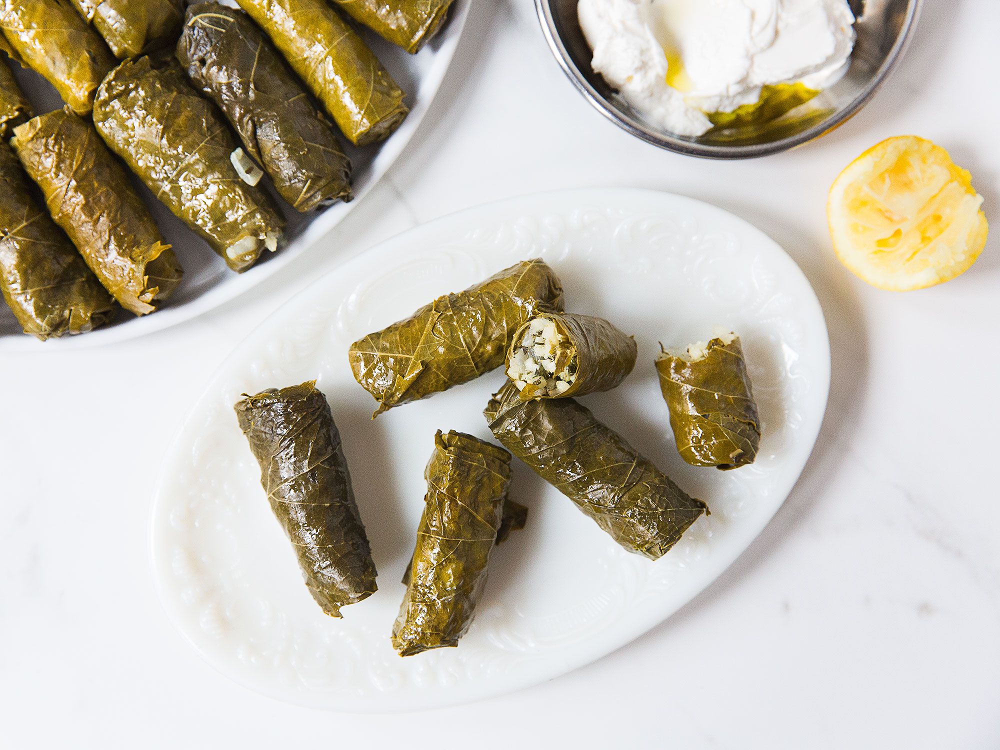 Dolmakadia, the Greek word for stuffed grape leaves, is one of the most iconic recipes of Greek cuisine and, although there are many varieties, the meatless version is the most common. In the warmer months, try to find and use fresh grape leaves; they are more tender and flavorful than the jarred types. Out of season, jarred leaves are a fine substitute (we prefer the Orlando brand). Get the recipe for <a href="http://www.saveur.com/greek-grape-leaves-stuffed-with-rice-herbs-dolmas-recipe">Greek Stuffed Grape Leaves With Rice and Herbs (Dolmadakia)</a>