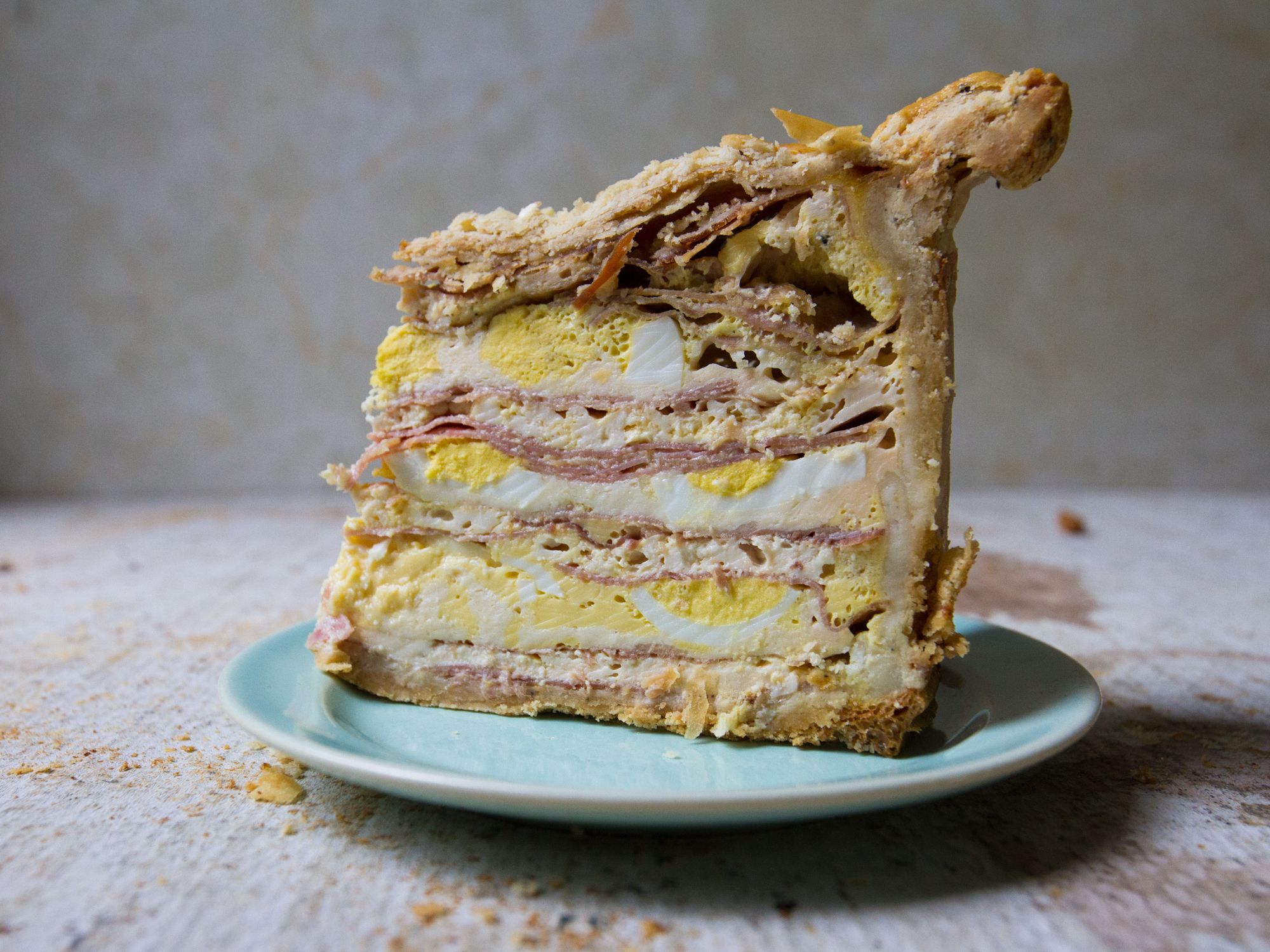 This Neapolitan savory pie, a traditional Easter Day treat filled with meat, cheese, and eggs, comes from Mary Mazzacco of Tinton Falls, New Jersey. Get the recipe for <a href="https://www.saveur.com/pizza-gain/">Pizza Chiena</a>