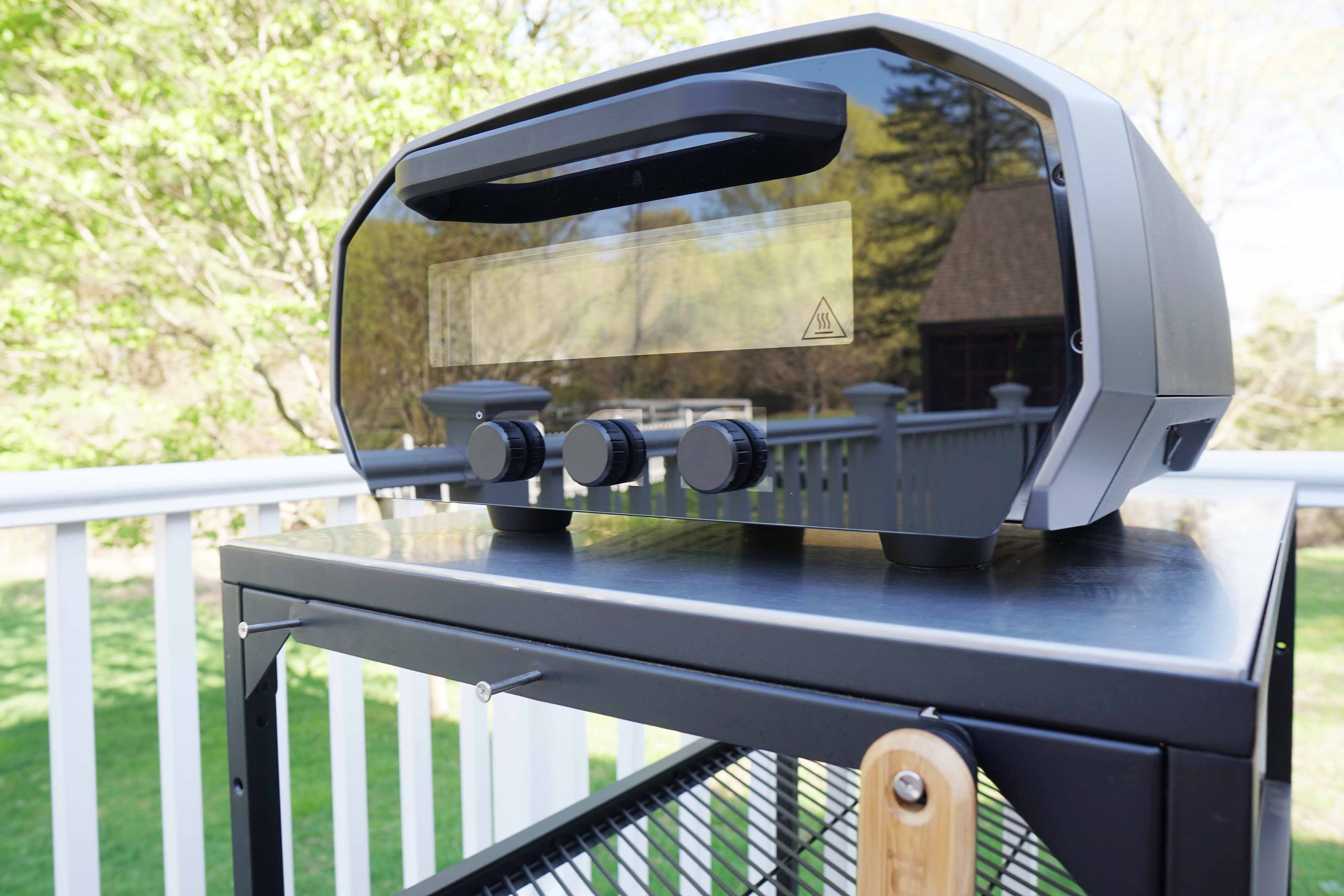 The Ooni Volt on a stainless steel table